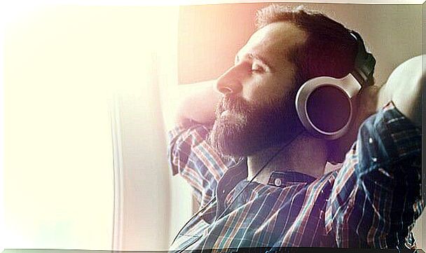 man listening to relaxing music