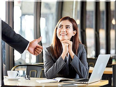 woman receiving praise at work