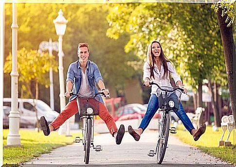 couple riding a bicycle