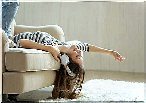 Woman listening to music with headphones.