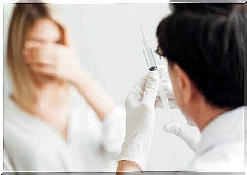 woman afraid of injection