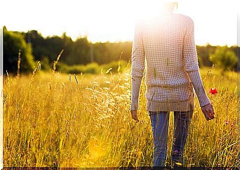 woman walking in the sun