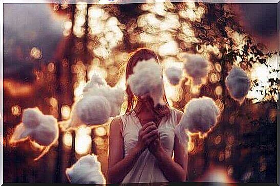 girl surrounded by clouds