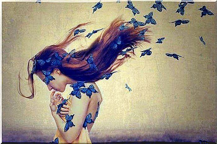 Woman with blue butterflies in her hair.