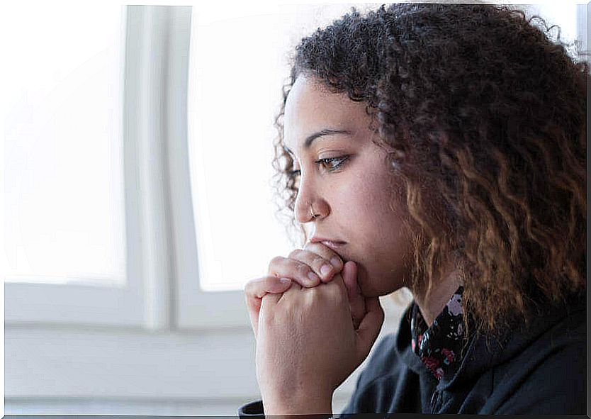 worried and thoughtful woman