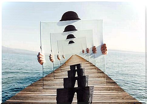 Man holding mirror representing infinity