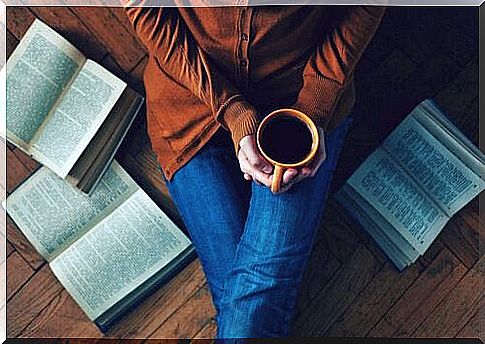 woman-having-coffee-with-books