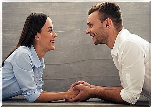 Man and woman smiling at each other