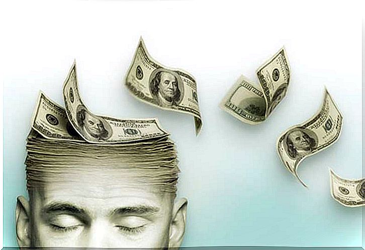 Money bills flying from man's head